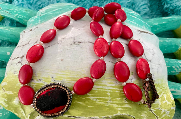 Red Faux Stone Necklace with Red Cow Print Pendant Toggle Necklace