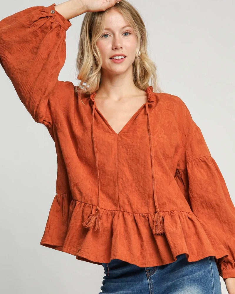 Plus Size Burnt Orange Textured Babydoll Long Balloon Sleeve Tie Top