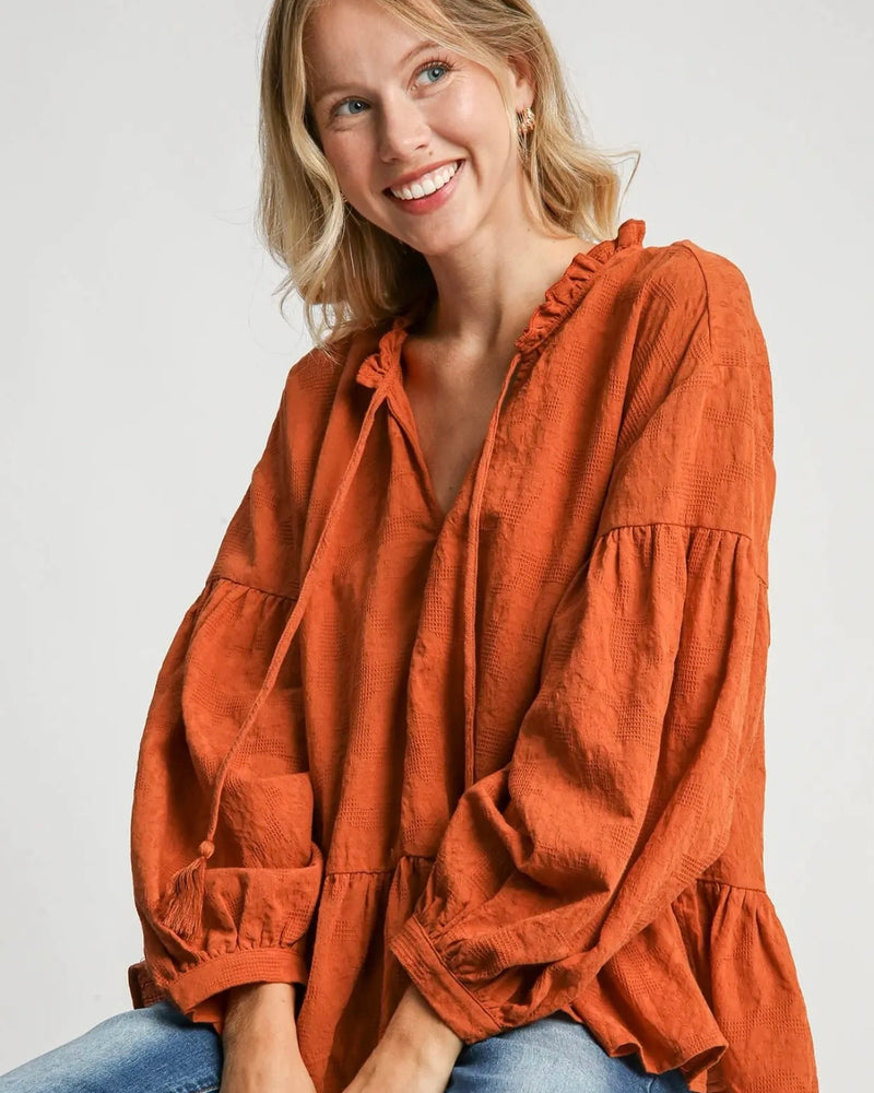 Plus Size Burnt Orange Textured Babydoll Long Balloon Sleeve Tie Top