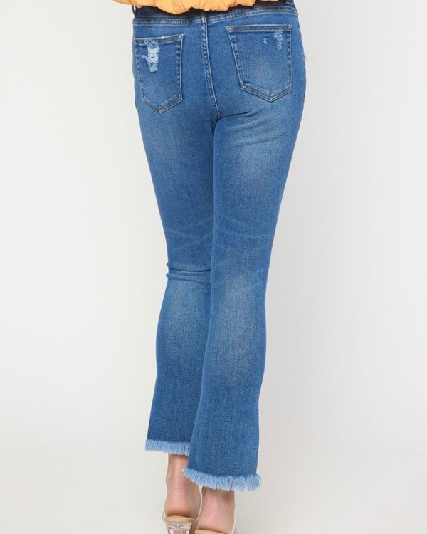 High-waisted denim skinny jeans featuring slight distressed detail
