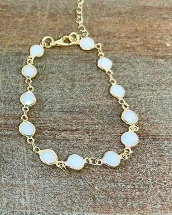White Bead Surround in Gold Tone Bracelet