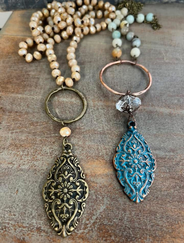 Glass Like Turquoise Blue Bead Long Necklace with Gold Circle Pendant and Turquoise Metal Pendant