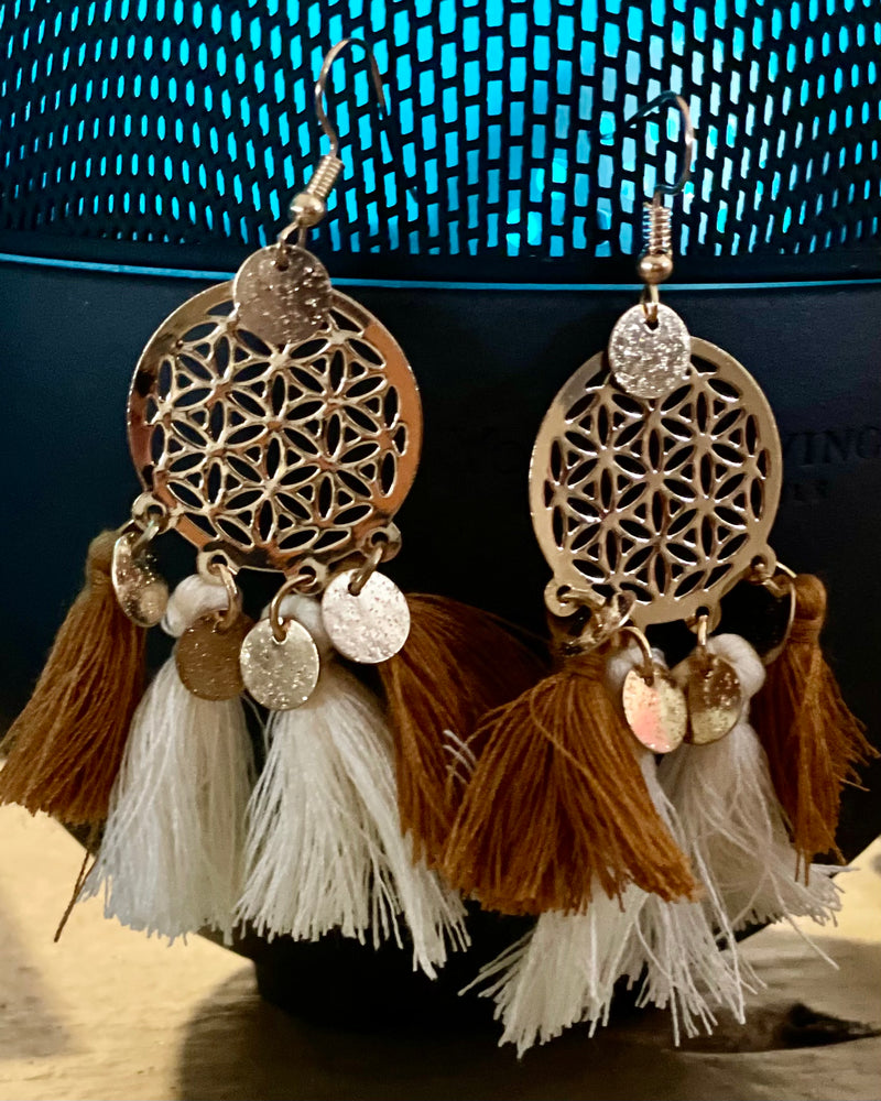 Boho dangle earring ls with brown and cream tassels on round gold medallion