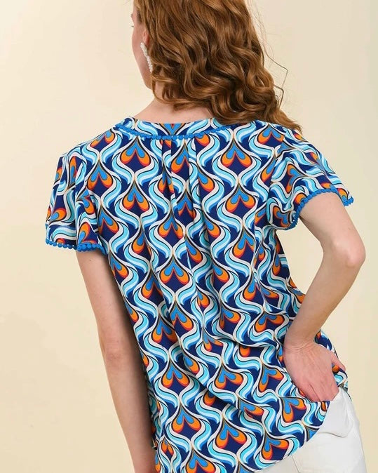 Shades of Blue with Orange Abstract Heart Print Pom Pom Top